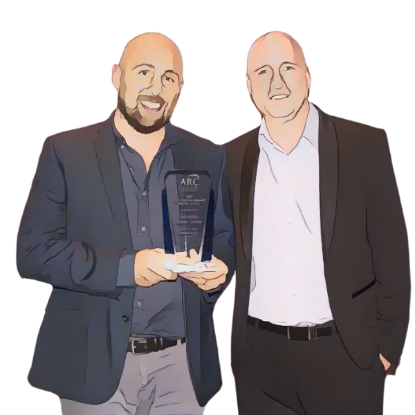 Nomi founders Joseph and Berry holding their ARC Award for bathroom remodeling